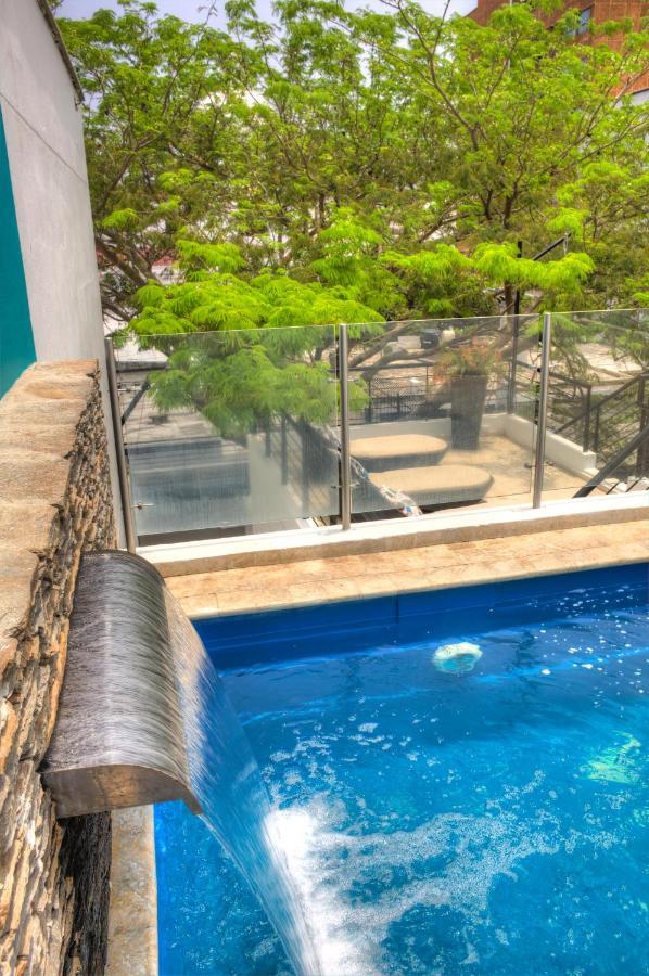 Casa De Leda, A Kali Hotel Santa Marta  Exteriér fotografie A pool barrier