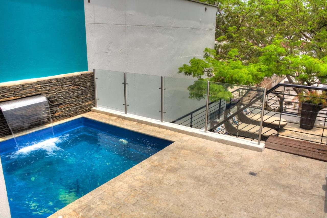 Casa De Leda, A Kali Hotel Santa Marta  Exteriér fotografie A pool in a private home