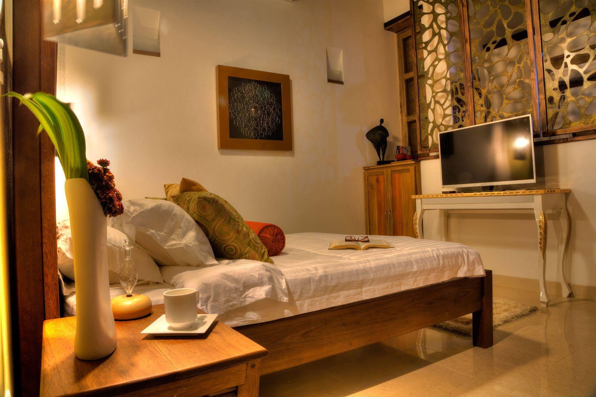 Casa De Leda, A Kali Hotel Santa Marta  Exteriér fotografie A bedroom at the hotel